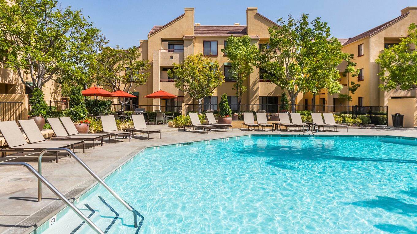 Pool view at Ambrose Apartment Homes at University Town Center in Irvine, CA.