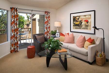 View of living room at Harvard Court Apartment Homes at University Town Center in Irvine, CA.