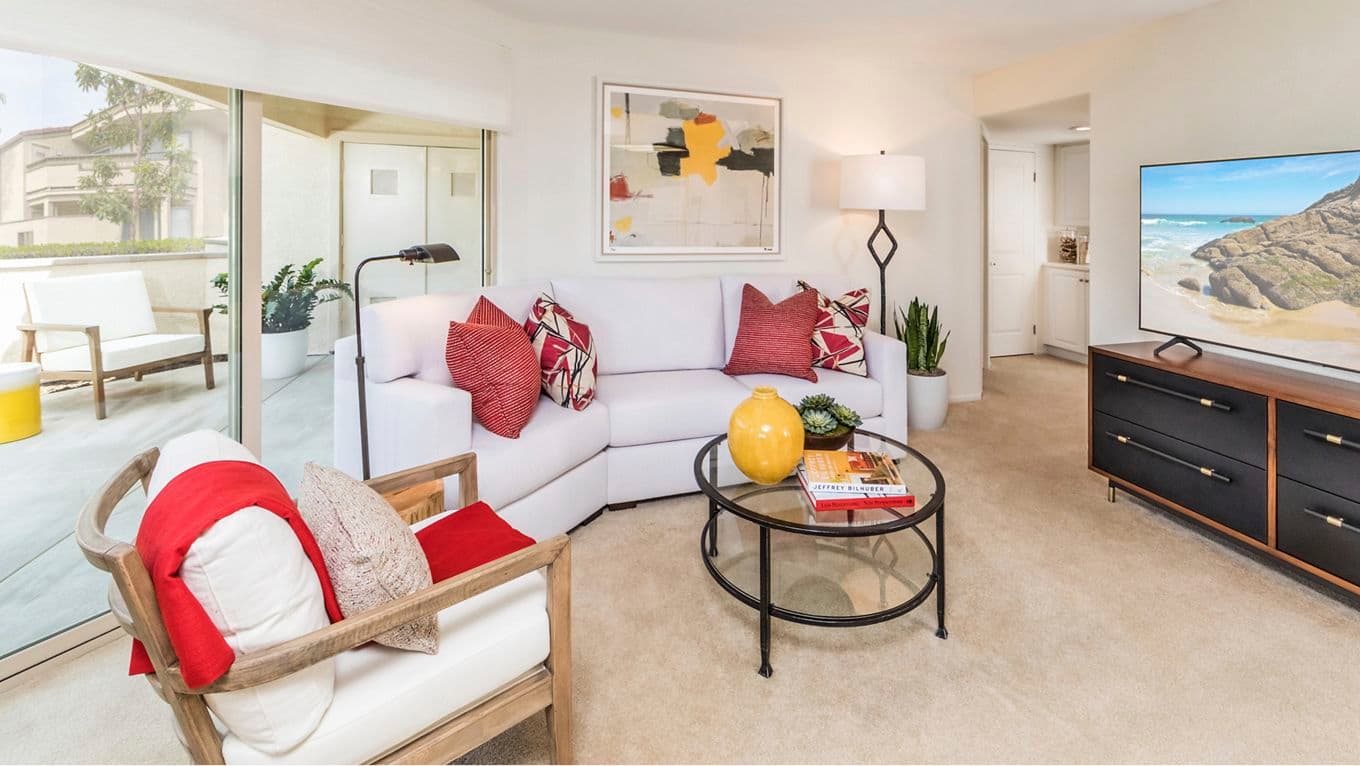 Interior view of living room at Stanford Court Apartment Homes at University Town Center in Irvine, CA.