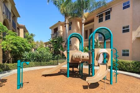 Exterior view of playground at Villa Coronado Apartment Homes in Irvine, CA.