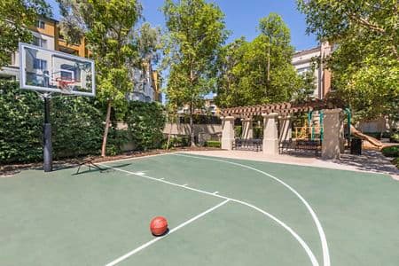 Exterior view of basketball court at Villa Siena Apartment Homes in Irvine, CA.