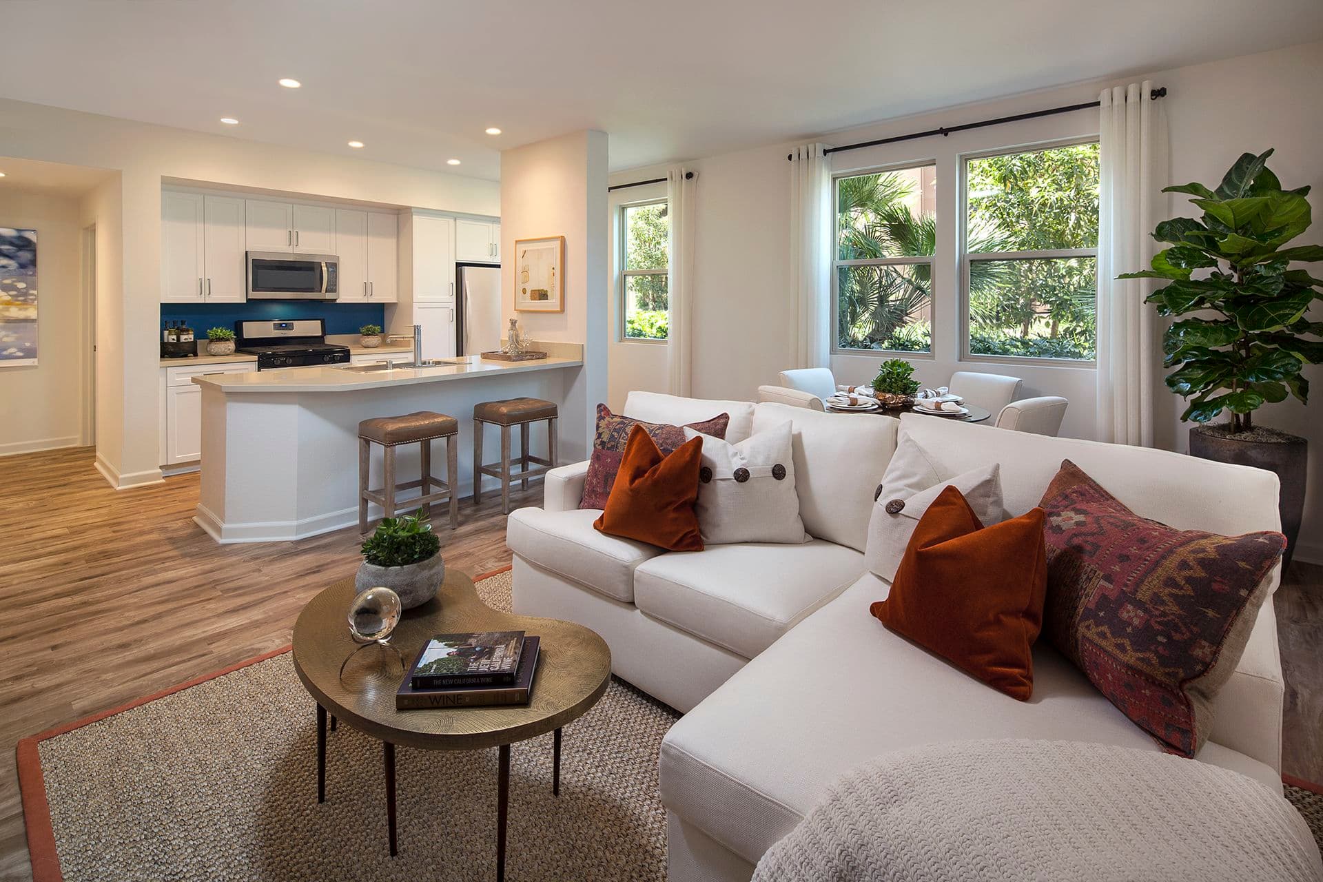 Living room and kitchen of Westview at Irvine Spectrum Apartment Homes in Irvine, CA.