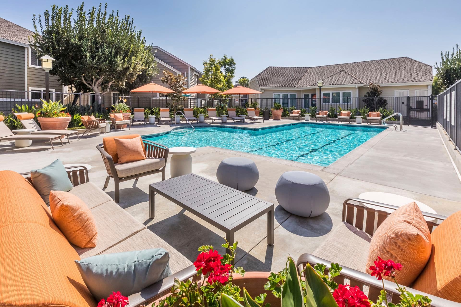 Exterior view of pool area at Windwood Glen Apartment Homes in Irvine, CA.