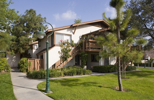 Exterior view of Woodbridge Pines Apartment Homes in Irvine, CA.