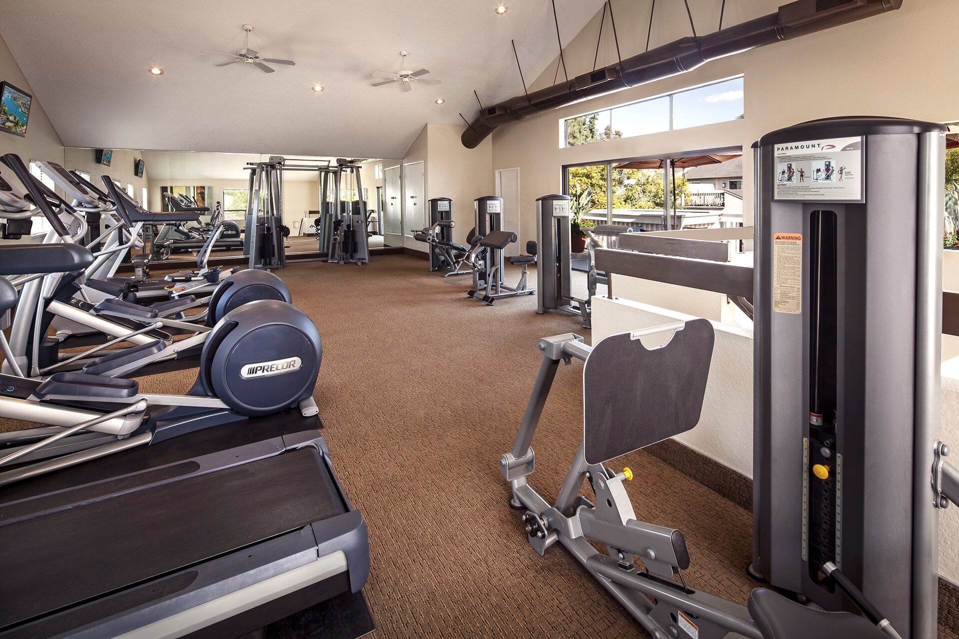 Interior view of fitness center at Woodbridge Villas Apartment Homes in Irvine, CA.