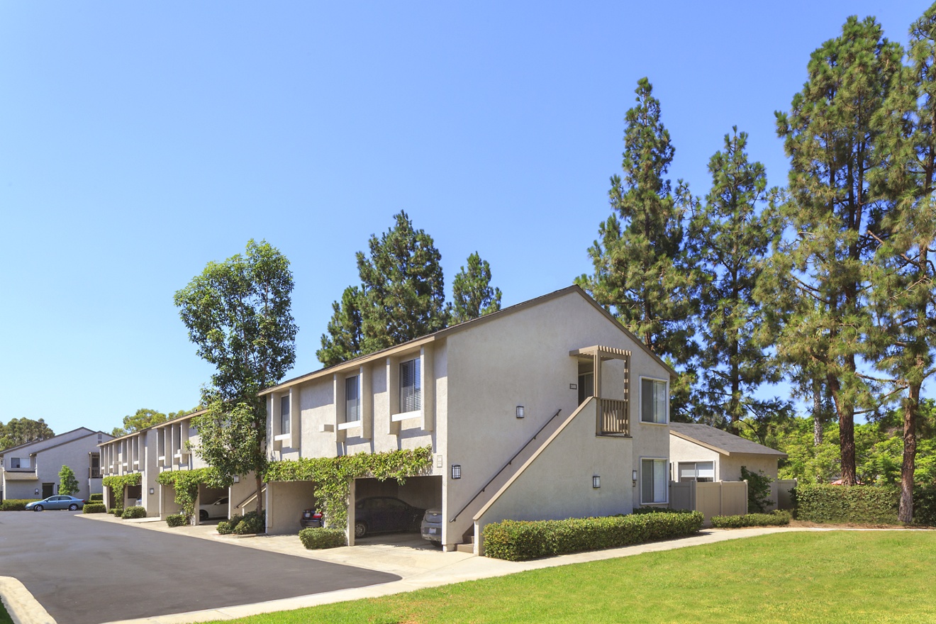 Exterior view of Woodbridge Villas Apartment Homes in Irvine, CA.