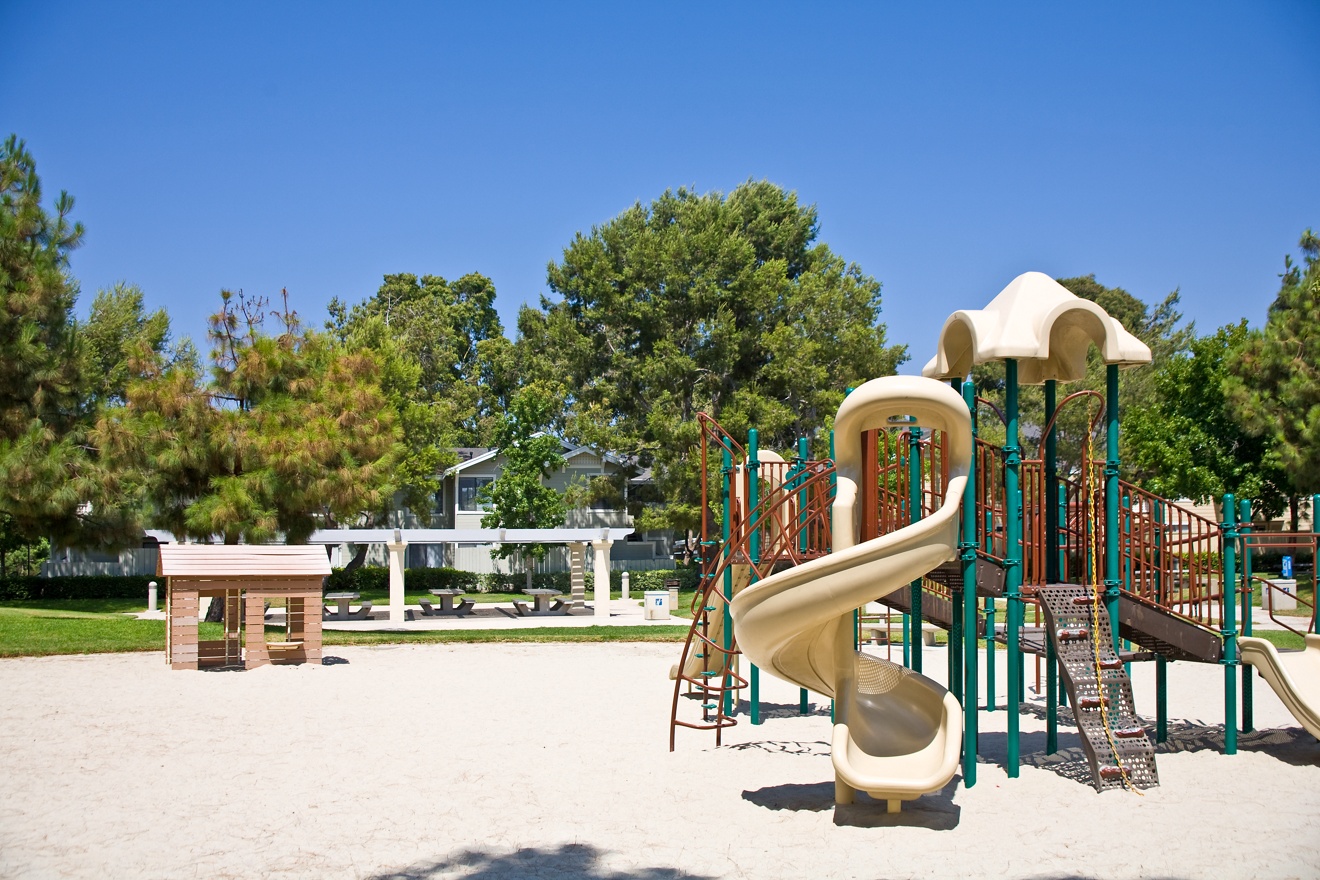 Exterior view of playground at Woodbridge Willows Apartment Homes in Irvine, CA.