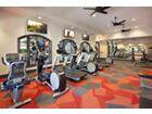 Interior view of the fitness center at Woodbury Court Apartment Homes in Irvine, CA.
