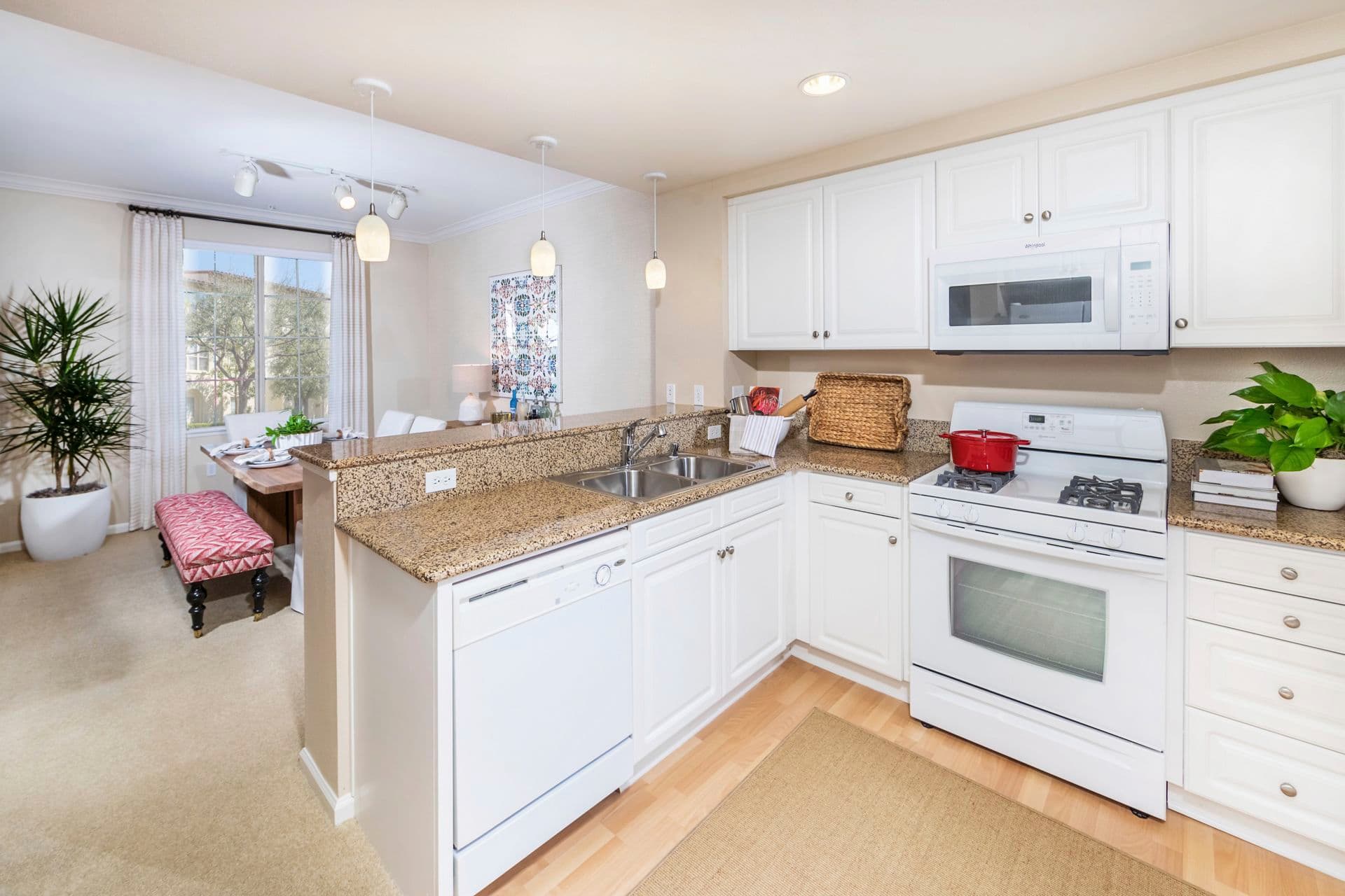 Interior view of Kitchen at Woodbury Lane Apartment Homes in Irvine, CA.
