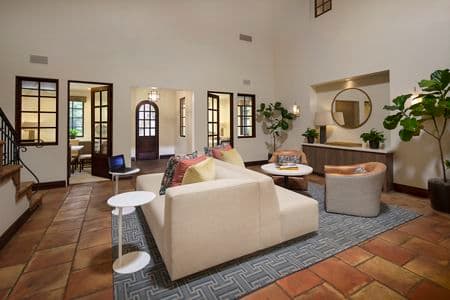 Interior view of clubhouse at Woodbury Place Apartment Homes in Irvine, CA.