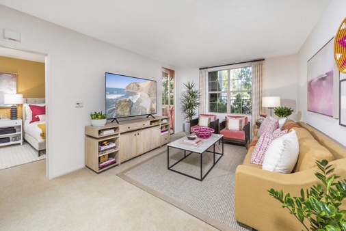 Interior view of living room at Woodbury Square Apartment Homes in Irvine, CA.