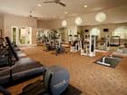 Interior view of fitness center at Woodbury Square Apartment Homes in Irvine, CA.