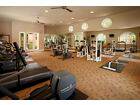 Interior view of fitness center at Woodbury Square Apartment Homes in Irvine, CA.