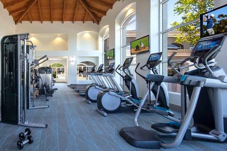 Interior view of fitness center at Vista Real Apartment Homes in Mission Viejo, CA.