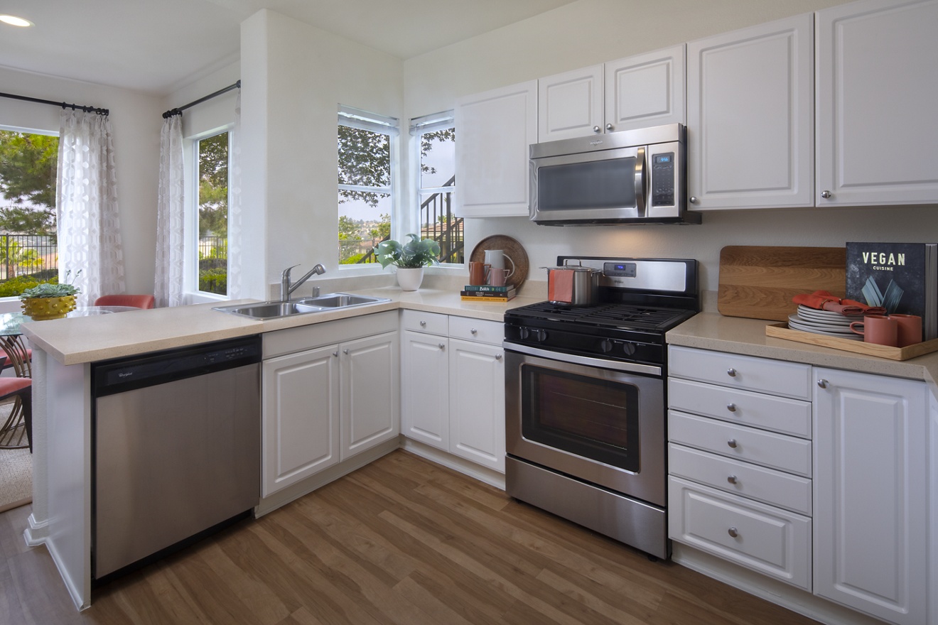 Interior view of kitchen at Vista Real Apartment Homes in Mission Viejo, CA.