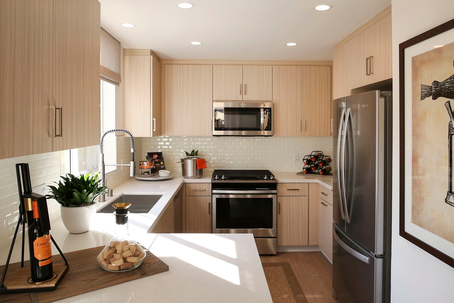 Interior view of kitchen at Baypointe Apartment Homes in Newport Beach, CA.