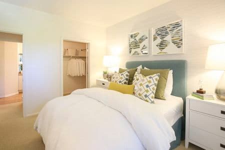 Interior view of bedroom at Newport Bluffs Apartment Homes in Newport Beach, CA.