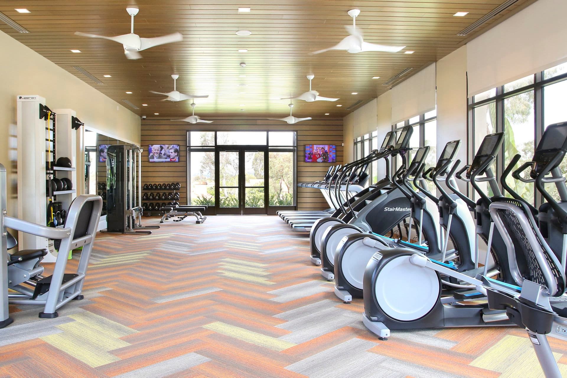 Interior view of fitness center at Newport North Apartment Homes in Newport Beach, CA.