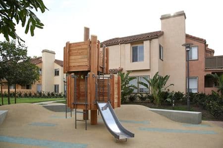 Exterior view of playground at Newport North Apartment Homes in Newport Beach, CA.