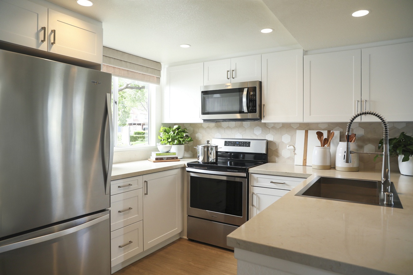 Interior view of kitchen at Newport North Apartment Homes in Newport Beach, CA.