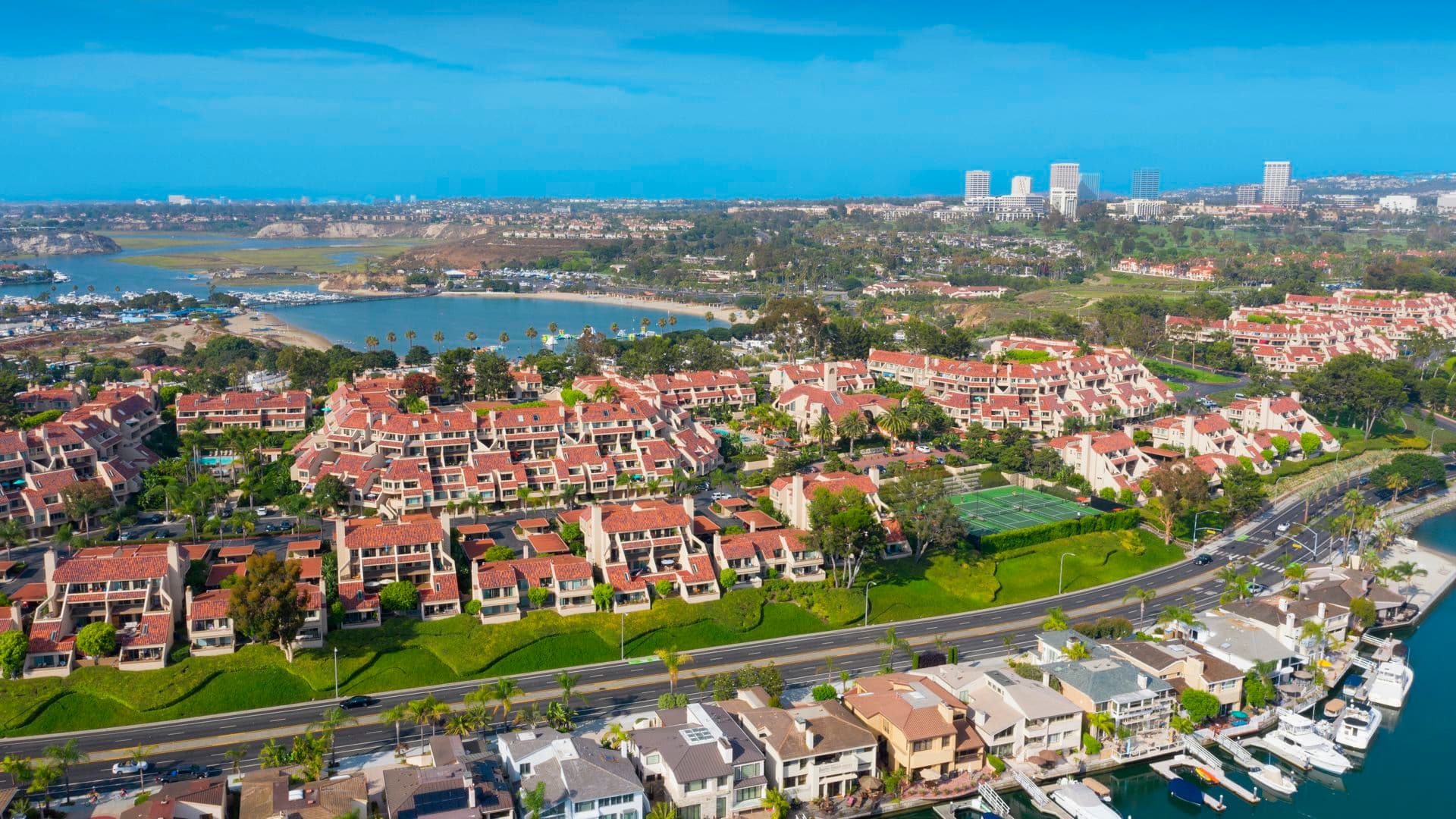 Drone view of Promontory Point Apartment Homes in Newport, CA.
