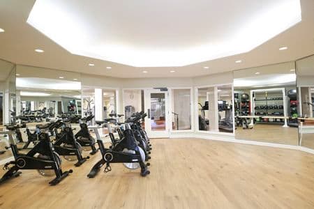 Interior view of fitness center at Promontory Point Apartment Communities in Newport Beach, CA.