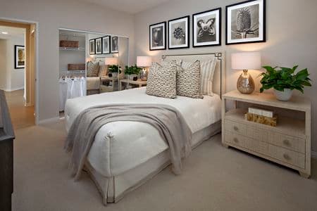 Interior view of bedroom at The Colony at Fashion Island in Newport Beach, CA.