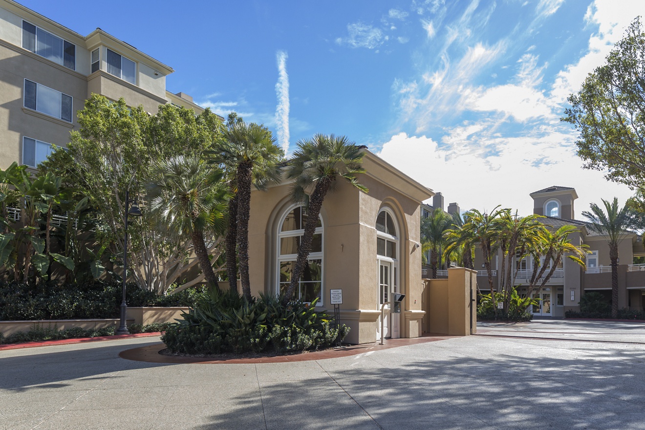 Exterior view of entrance at The Colony at Fashion Island Apartment Homes in Newport Beach, CA.