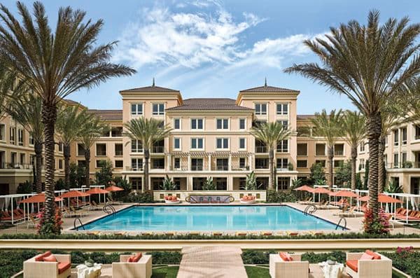 Pool view of Villas Fashion Island Apartment Homes in Newport Beach, CA.