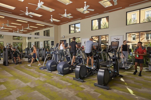 People working out inside fitness center
