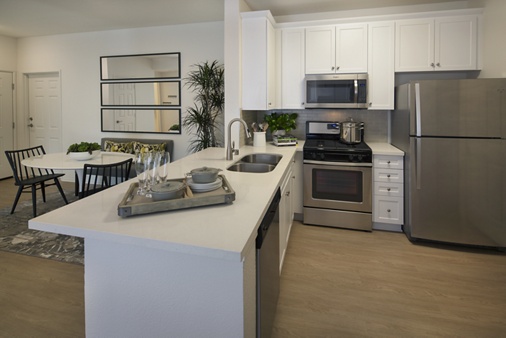 Interior view of a kitchen at Las Flores Apartment Homes in Rancho Santa Margarita, CA.