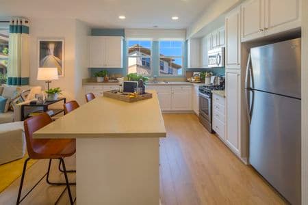 Interior view of kitchen at Amalfi Apartment Homes in Tustin, CA.