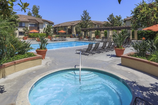 View of pool and spa at Rancho Alisal Apartment Homes in Tustin, CA.