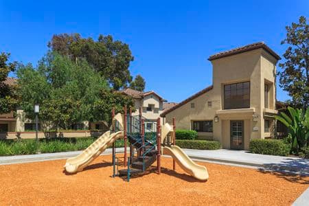 Exterior view of playground at Rancho Alisal Apartment Homes in Tustin, CA.