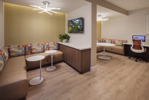 Interior view of business center iLounge at Rancho Mariposa Apartment Homes in Tustin, CA.