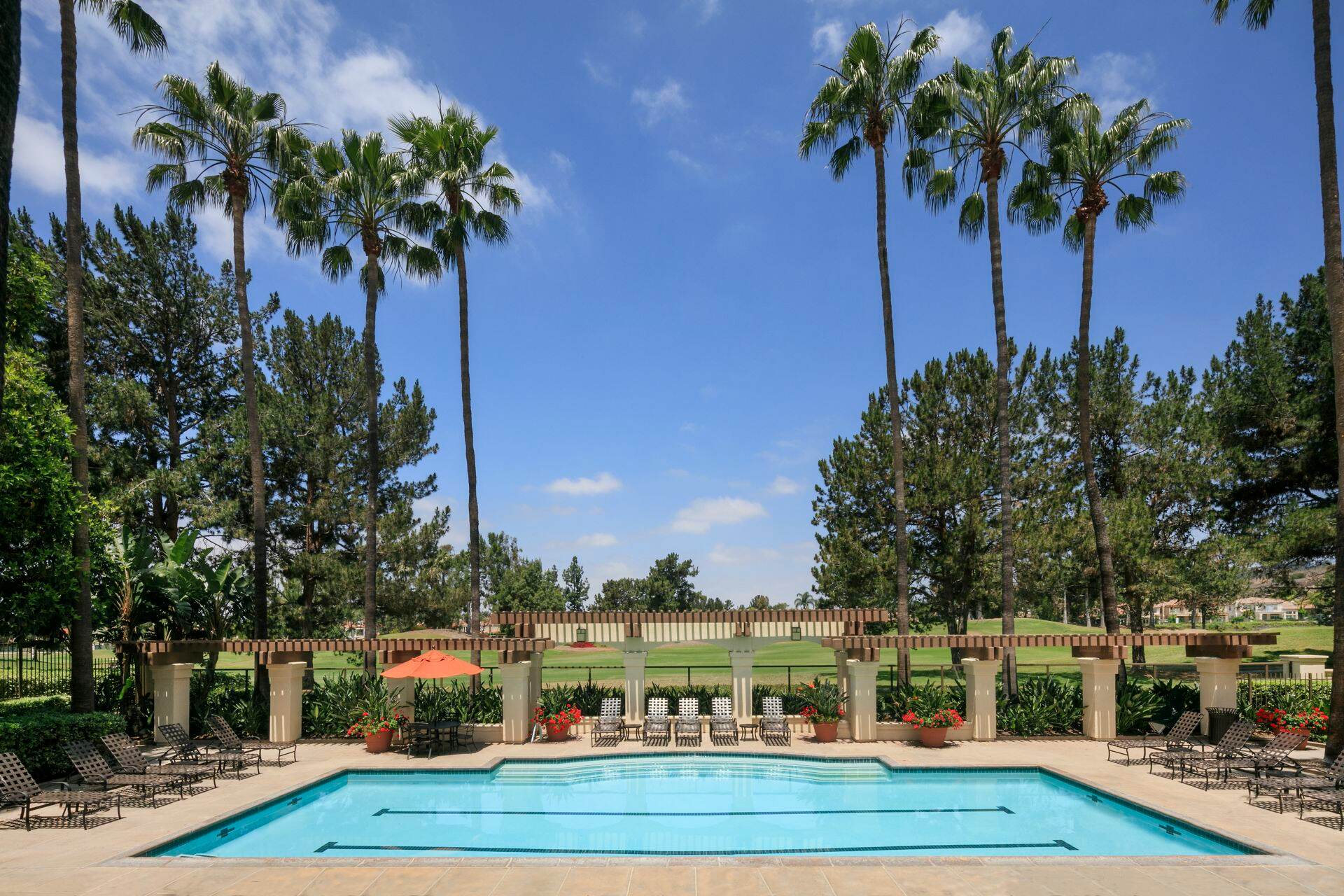 Exterior view of pool at Sierra Vista Apartment Homes in Tustin, CA.