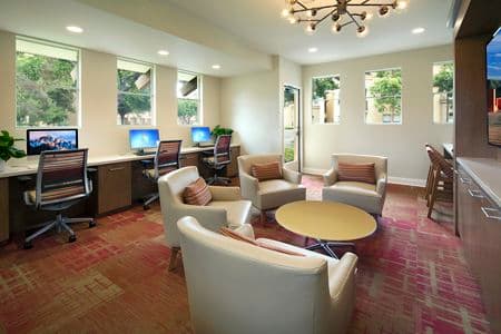 Interior view of business center iLounge at Sierra Vista Apartment Homes in Tustin, CA.