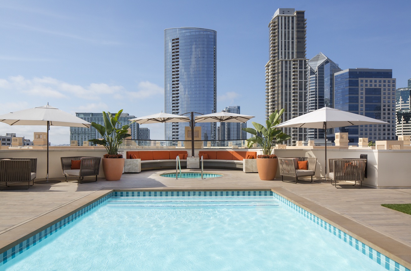 Exterior view of roof deck pool at Harborview Apartment Homes in San Diego, CA.