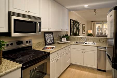 Interior view of kitchen at La Jolla Palms Apartment Homes in San Diego, CA.