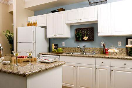 Interior view of kitchen at Monte Vista Apartment Homes in Mission Valley, CA.