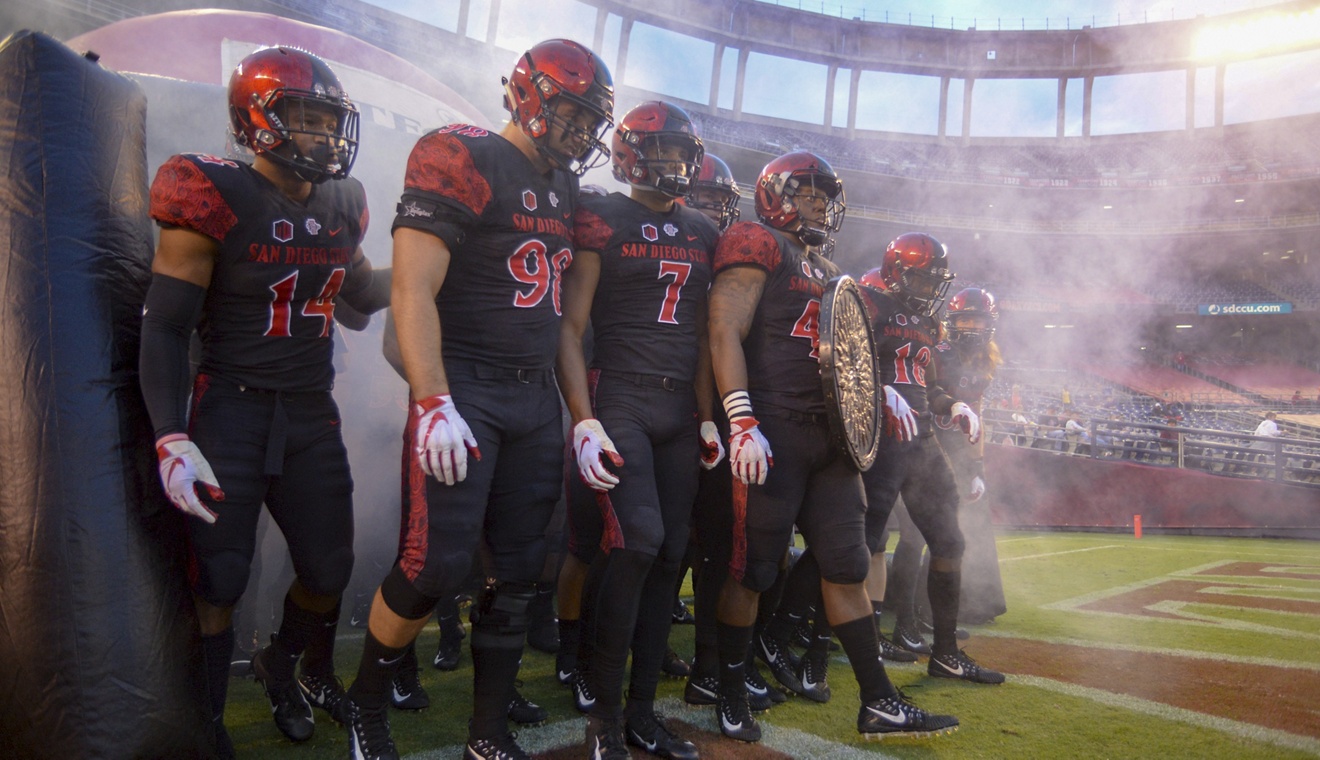 SAN DIEGO, CA - OCTOBER 12:  The starting line-up of the San Diego State Aztecs prepare to run onto the field prior to the start of  the 1st half against the Air Force Falcons at SDCCU Stadium on October 12, 2018 in San Diego, California.  (Photo by Kent Horner/Getty Images)