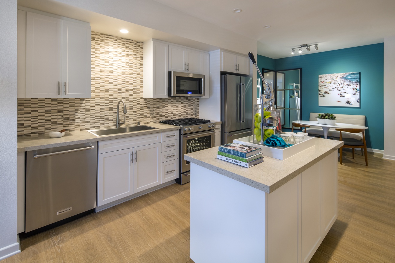 Interior view of kitchen of The Village Mission Valley Apartment Homes in San Diego, CA.