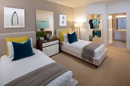 Interior view of bedroom at The Villas of Renaissance Apartment Homes in San Diego, CA.
