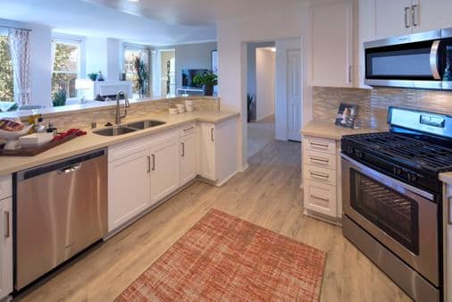 Interior view of kitchen at Torrey Villas Apartment Homes in San Diego, CA.