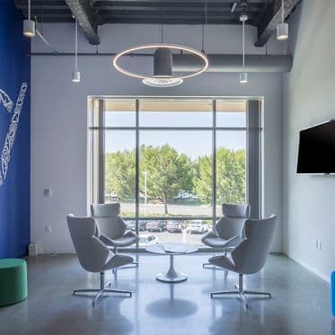 Customer suite photography of Cloudvirga at Jamboree Business Center -- a high end creative office space with open ceiling and polished concrete floors at 2875 Michelle Dr, suite 200, Irvine, CA 92606