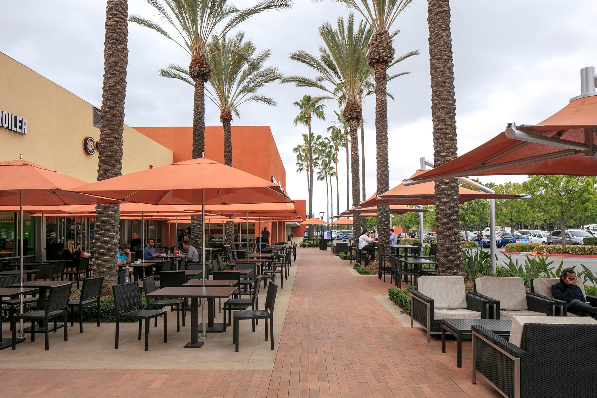 Exterior view of food courtyard at Sand Canyon Plaza at Irvine Spectrum in Irvine, CA.