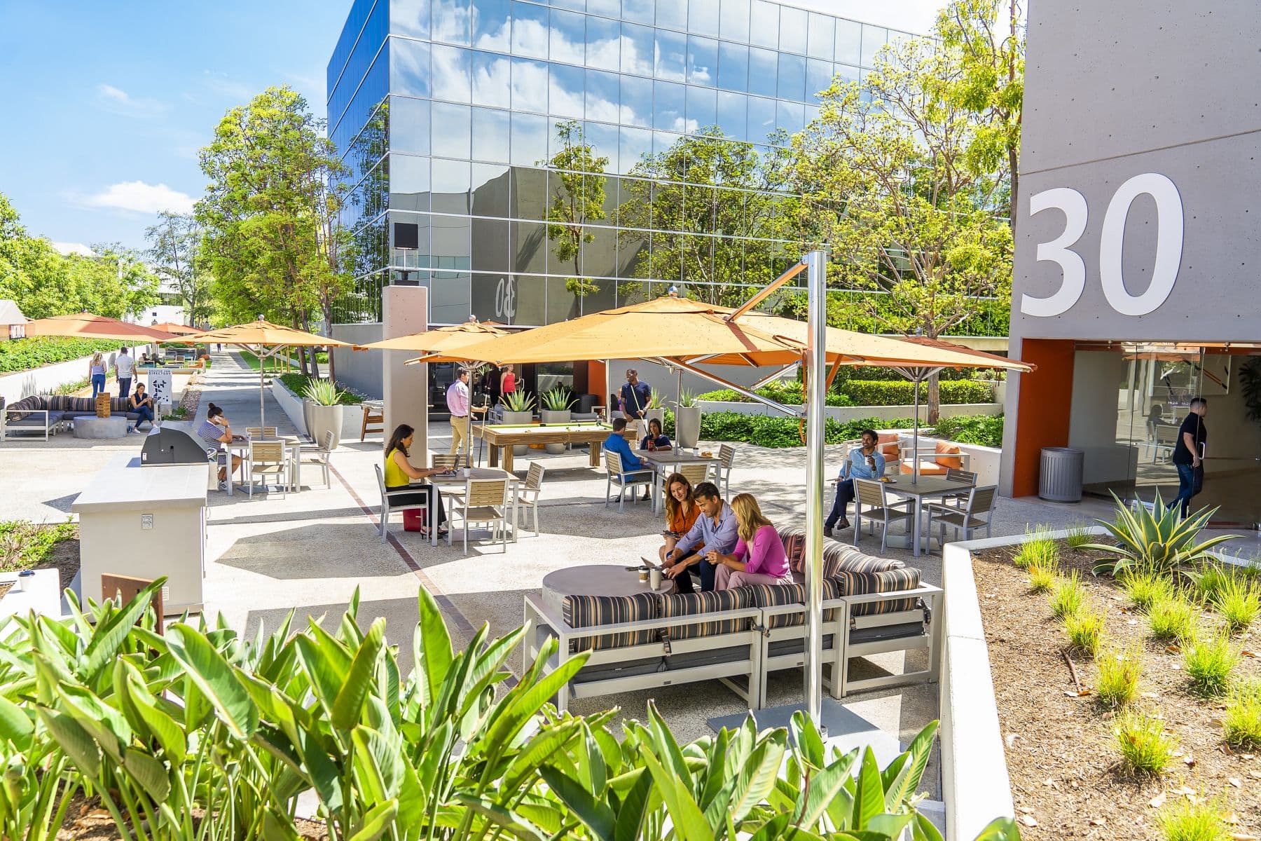 Lifestyle photography of The Commons near 38, 32 and 30 Executive Park at Venture Park in Irvine, CA