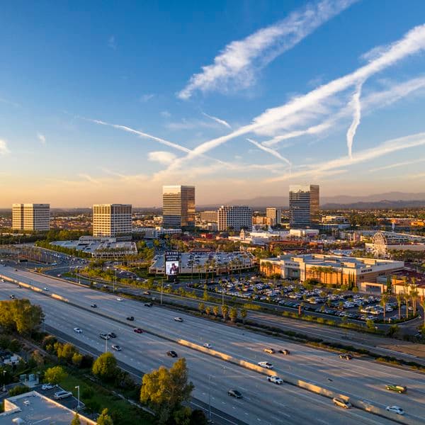 Aerial photography of the Irvine Spectrum area featuring snowy mountains in Irvine, CA