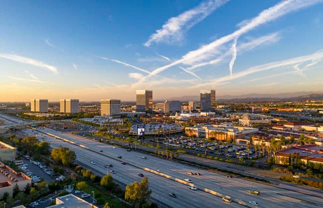 Aerial photography of the Irvine Spectrum area featuring snowy mountains in Irvine, CA