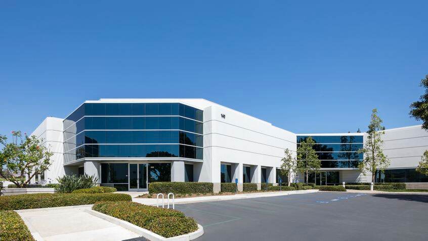 Exterior view of 140 Technology Park office building.